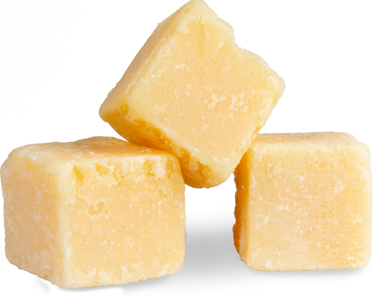 Parmesan Grana Padano Cheese Cubes Isolated on White .