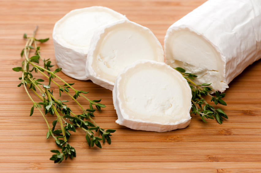 Slices of Goat cheese with fresh thyme